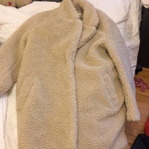 Medium length, oversized faux Sherpa coat
